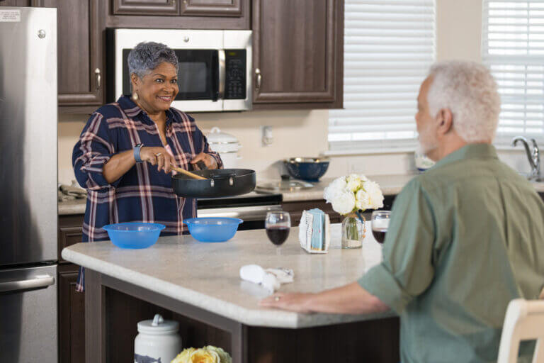Couple Having Dinner with glass of red wine - The Meadows