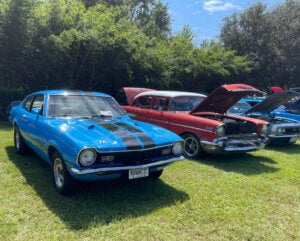 Cars lined up with hoods open at Creek Fire Car show weekend in Savannah, Georgia