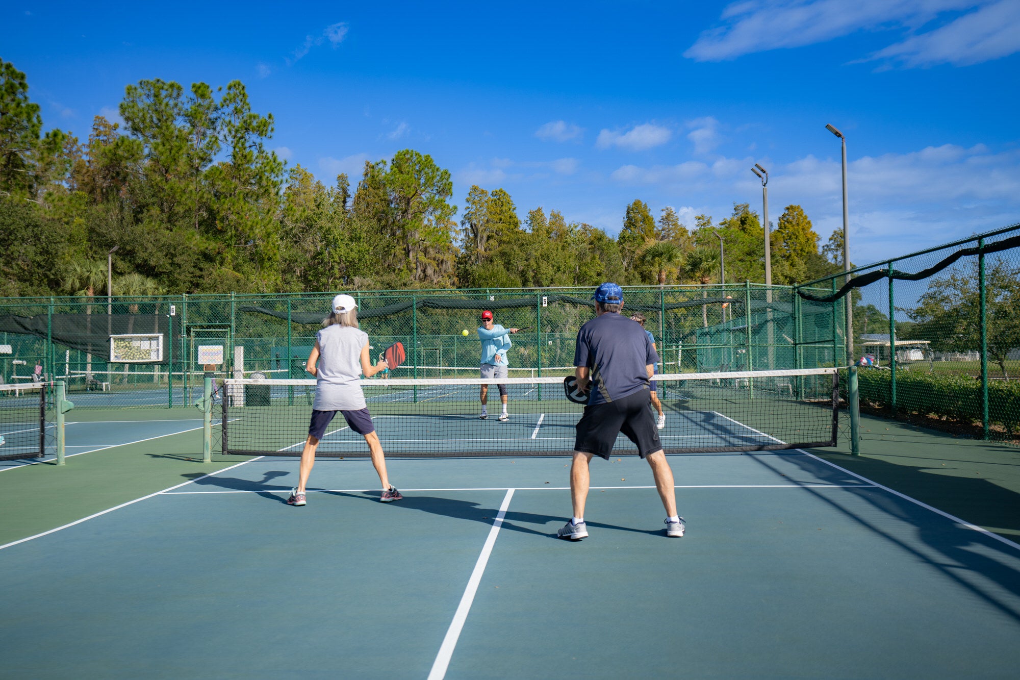 Residents playing pickleball