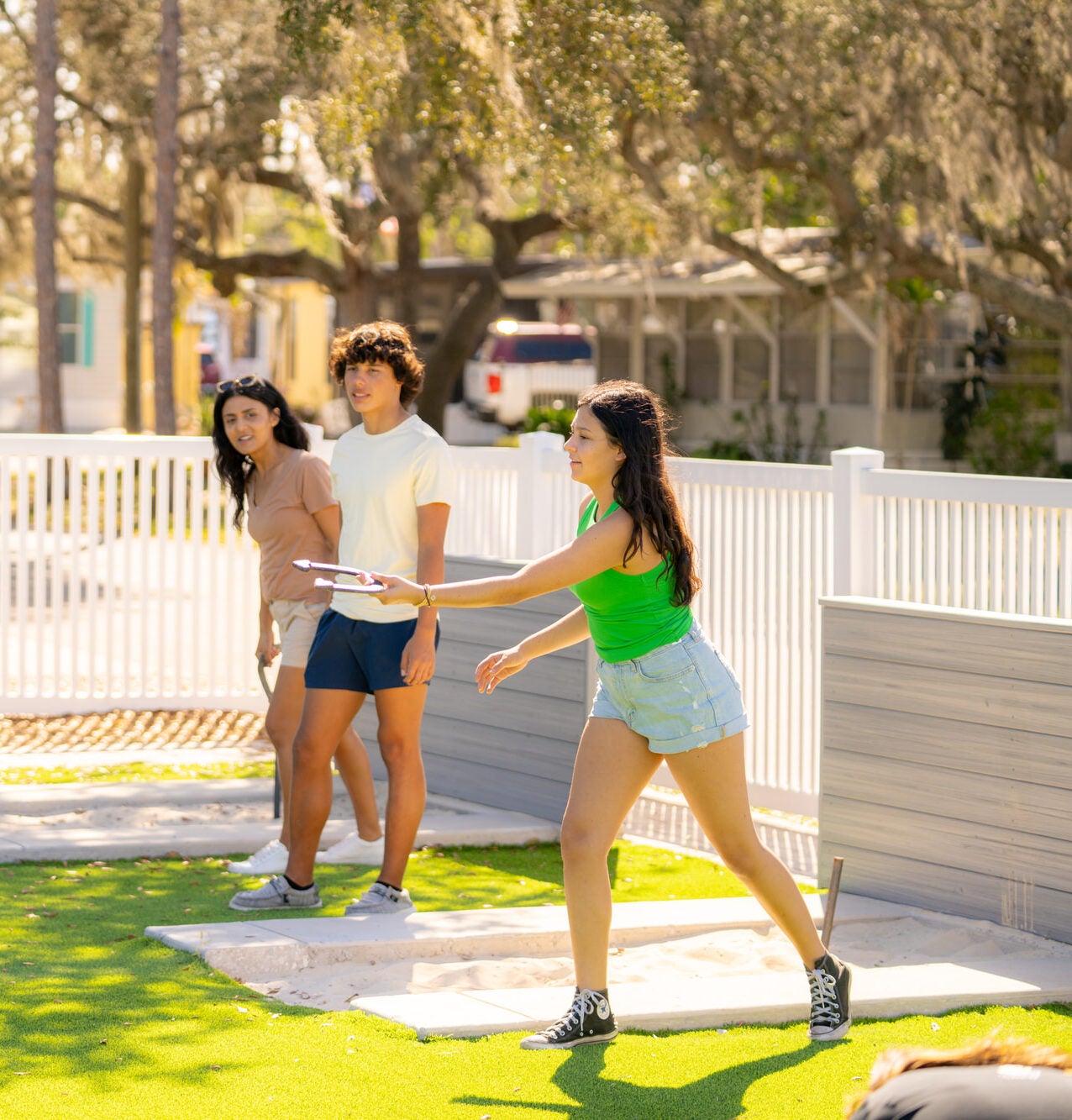 River Vista RV - Family Playing Horseshoes