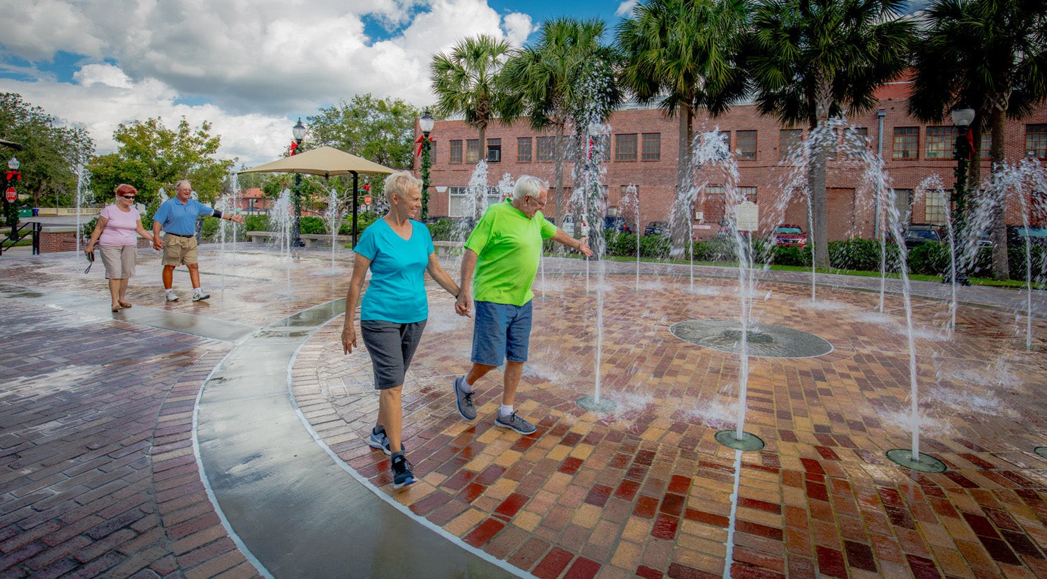 Couple enjoying downtown area outside of Hyde Park Village