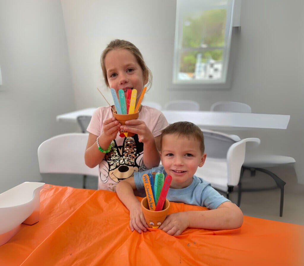 Kids making turkey crafts at CreekFire RV Resort in Savannah, Georgia.