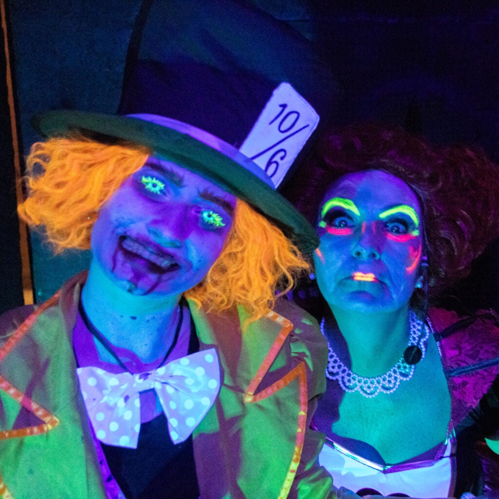 two haunted house characters looking at camera