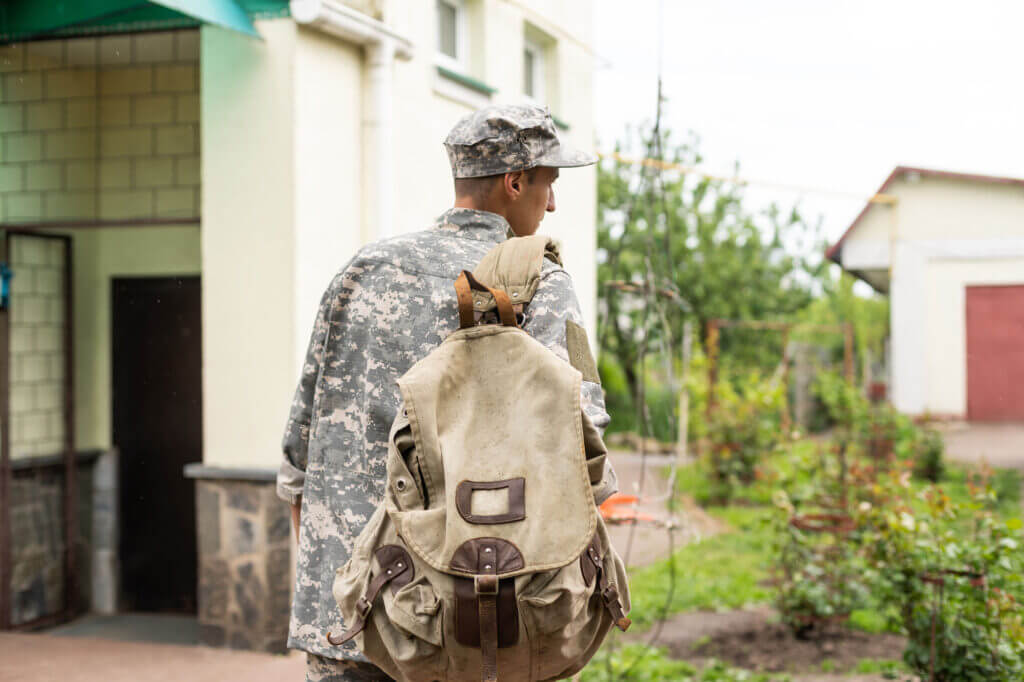 army veteran with back turned