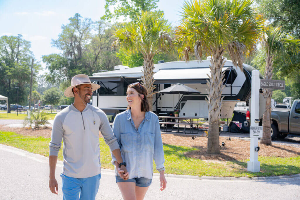 Couple walking through Lake Jasper RV Park in South Carolina.