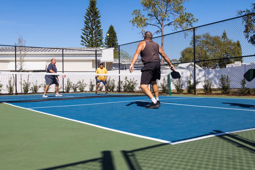 People playing pickleball at River Vista RV Park in Florida.