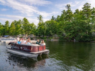 Boating on Sebago Lake along the Point Sebago Resort and campground in Casco, Maine.