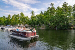 Boating on Sebago Lake along the Point Sebago Resort and campground in Casco, Maine.