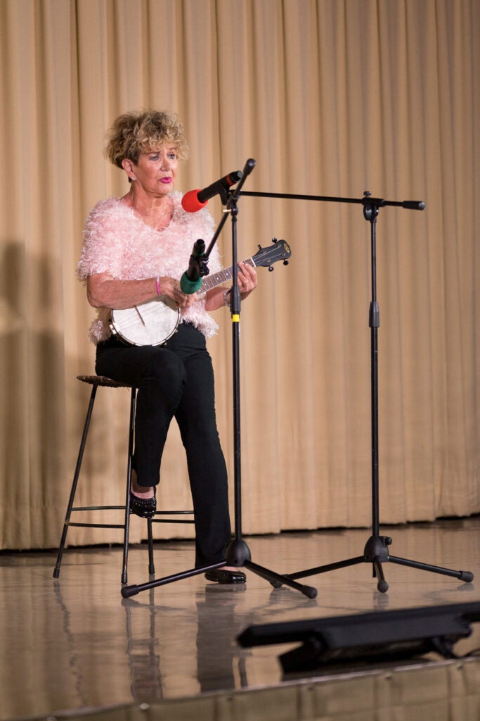 Woman sings at Cove's Got Talent in Florida.