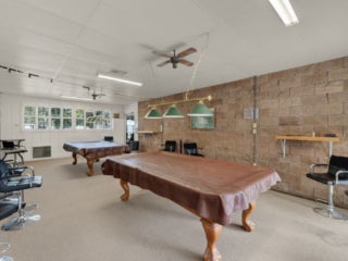 Pool tables in the billiards room at Holiday RV Park in Leesburg, Florida.