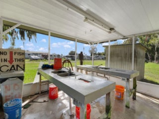 Fish cleaning station near the marina at Holiday RV Park in Leesburg, Florida.