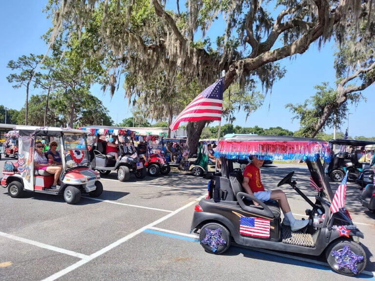 Annual patriotic golf cart parade at Holiday RV Park in Florida.