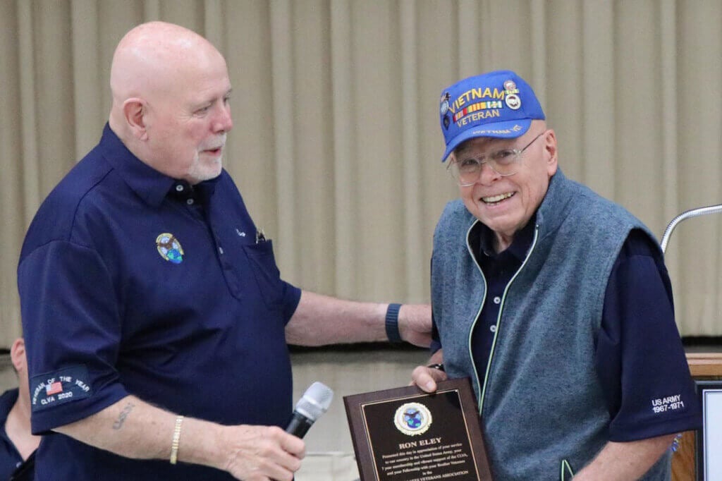 Ron Eley receives an award from the Cypress Lakes Veterans Association in Florida