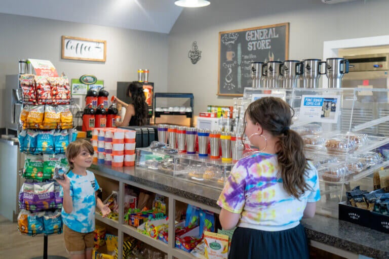 Kids inside the General Store at Point Sebago Resort in Casco, Maine.