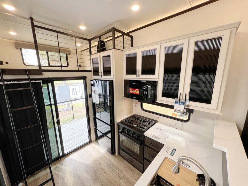 Kitchen inside the Sabre travel trailer at the RV SuperShow in Tampa.