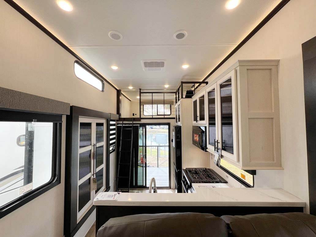 Kitchen inside the Sabre travel trailer at the RV SuperShow in Tampa.