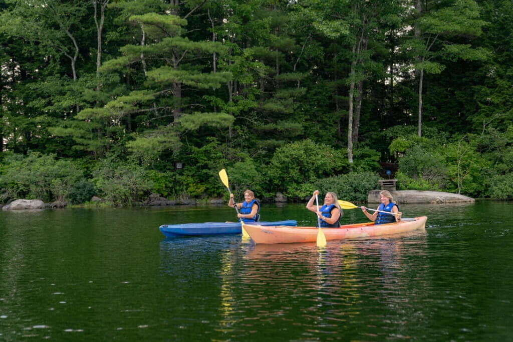 Kayaking along Sebago Lake outside of Point Sebago Resort in Maine.