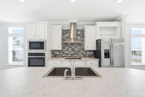 The kitchen inside a manufactured home in Estero Bay Village, a 55+ community in Florida.
