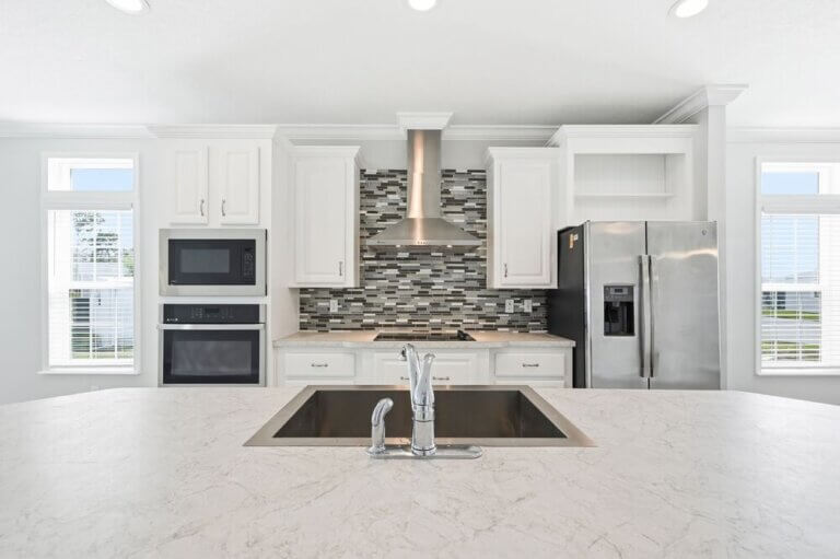 The kitchen inside a manufactured home in Estero Bay Village, a 55+ community in Florida.