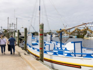 Large sponge boats tied up to the docks in Tarpon Springs.