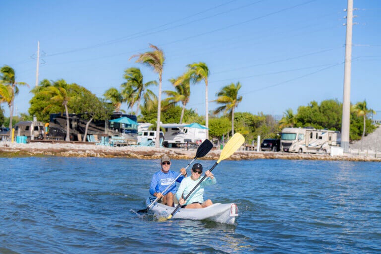 Couple kayaking off the coast of Big Pine Key RV Park in Florida.
