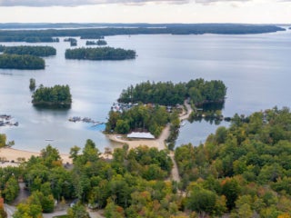 Drone view of the Island at Point Sebago Resort on Sebago Lake in Southern Maine.