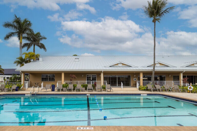 swimming pool in front of clubhouse