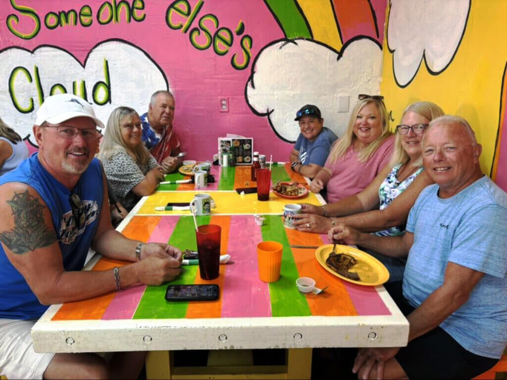 Seven guests from Blueway RV Park eat at FK Your Diet in Fort Myers, Florida.