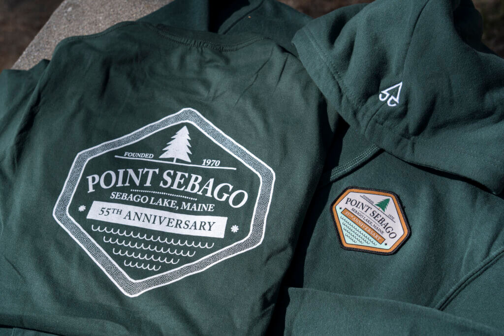 A t-shirt and sweatshirt designed for the Point Sebago Resort 55th anniversary in Maine.