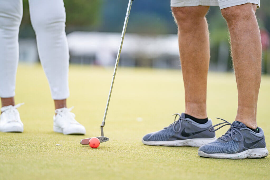 Man putting at Big Cypress Golf Club in Lakeland, Florida.