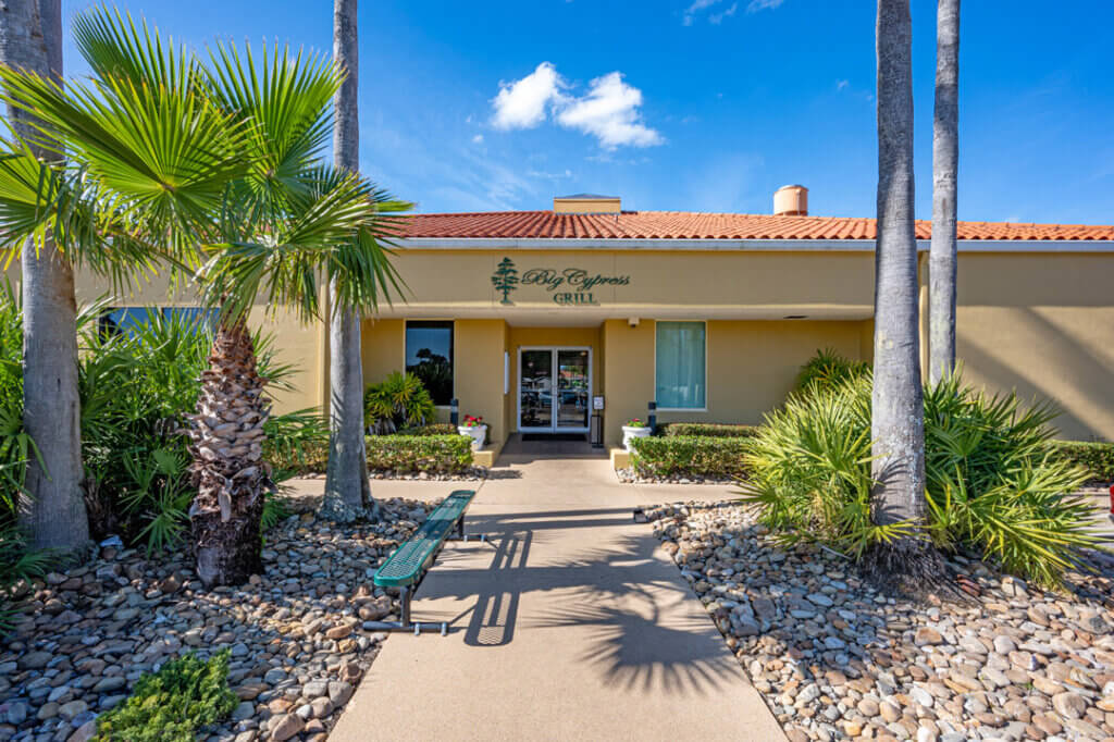 Grill_Cypress-Lakes-Village Exterior view of entrance to Big Cypress Grill