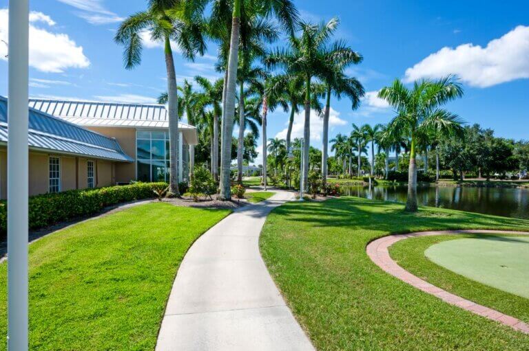 The pathway between the clubhouse and lake at Jamaica Bay Village, a 55+ community, in Fort Myers, Florida.