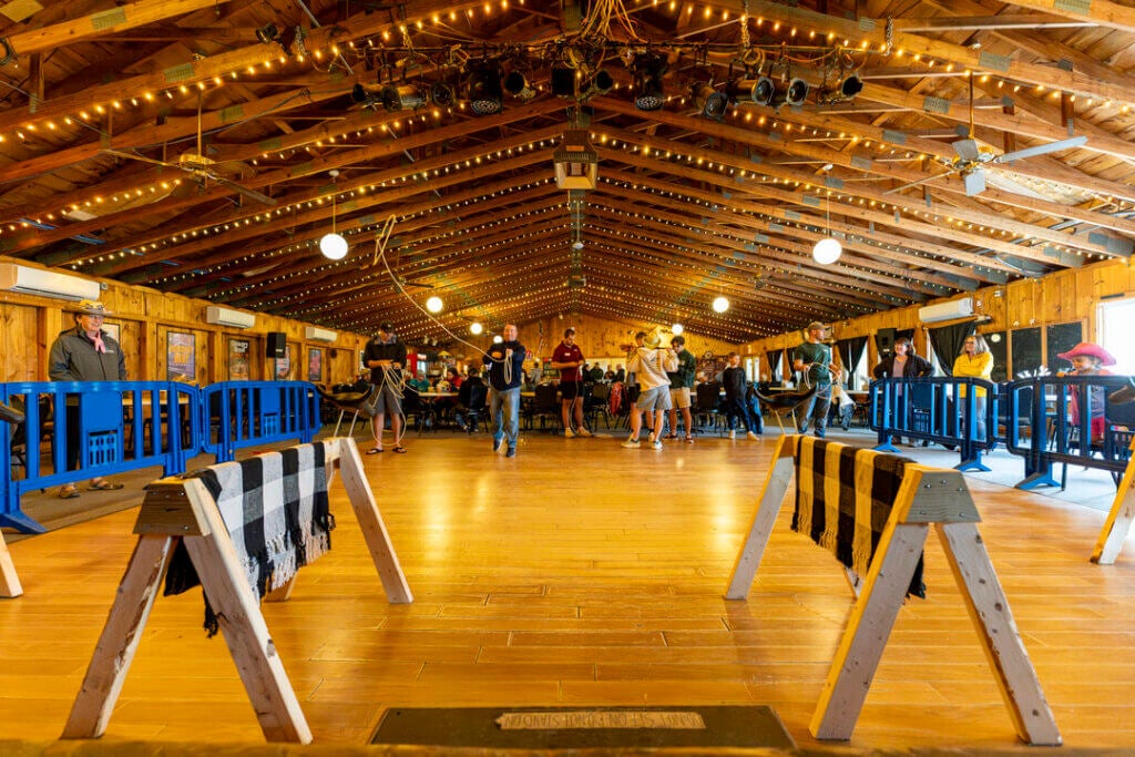 Point Sebago Resort guests learning to lasso during Country Western Weekend in Casco, Maine.