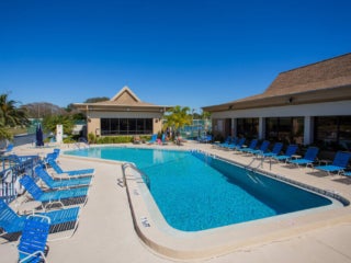 side view of Camelot Lakes pool and pool chairs