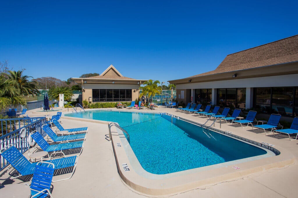 side view of Camelot Lakes pool and pool chairs