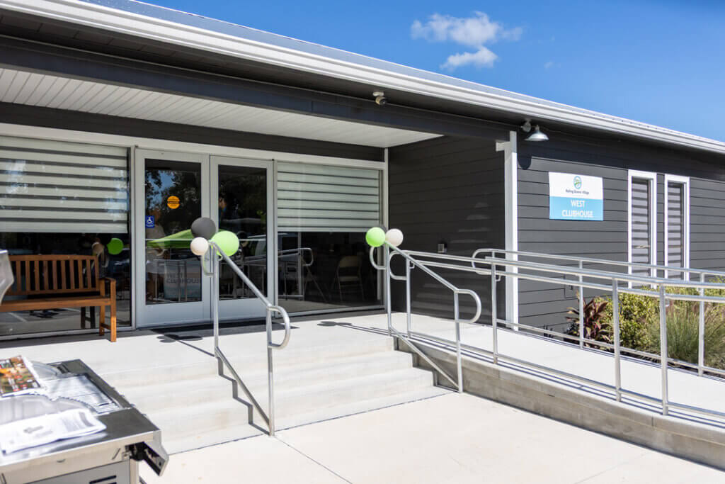 Exterior view of fully renovated West Clubhouse at Rolling Greens Village in Ocala, Florida.