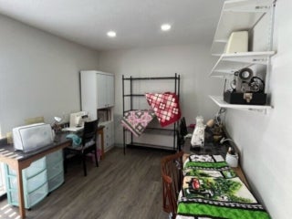 New sewing room with crafting supplies in the renovated West Clubhouse