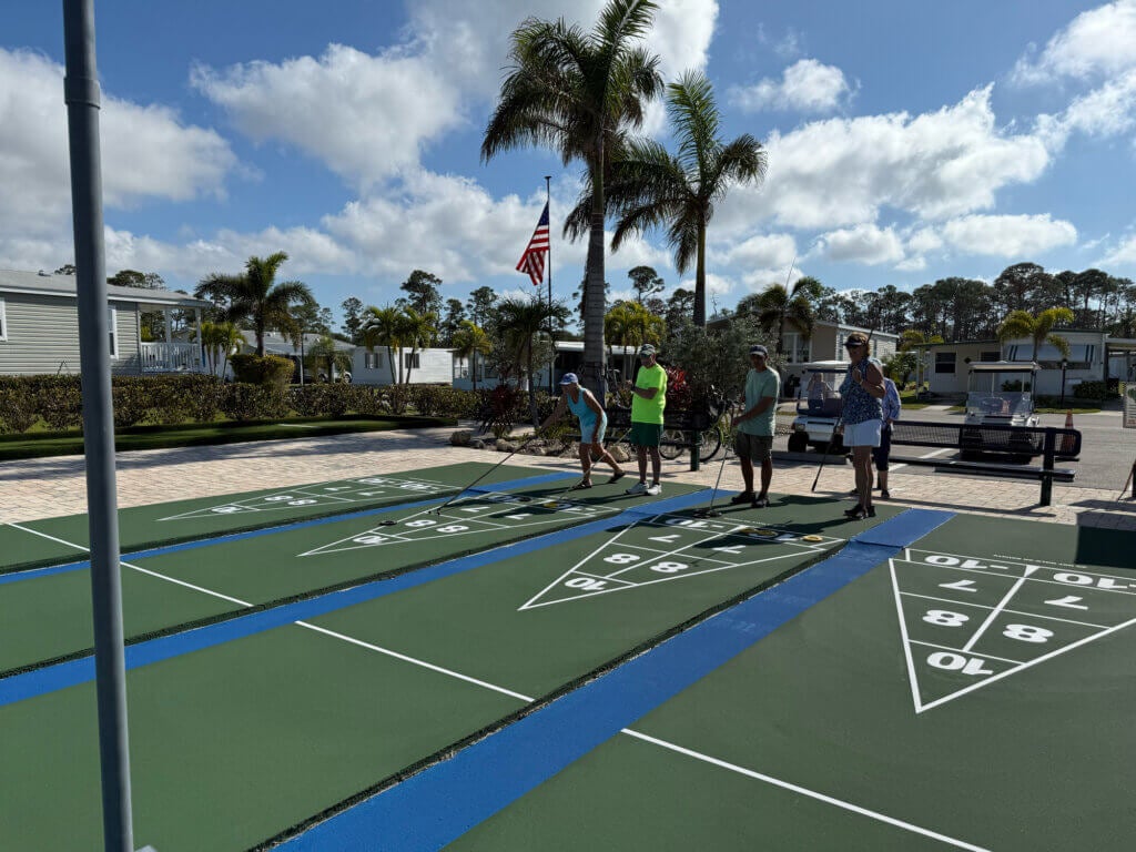 Residents playing Shufleboard at the Estero Bay Shuffleboard Courts