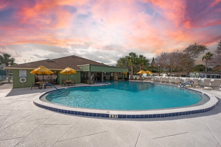 Swimming pool at sunset at clubhouse pool in Bear Creek Village