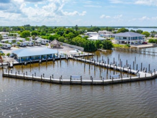 fishding docks at marina with rv sites in the background
