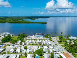 birds eye view of rv park and marina