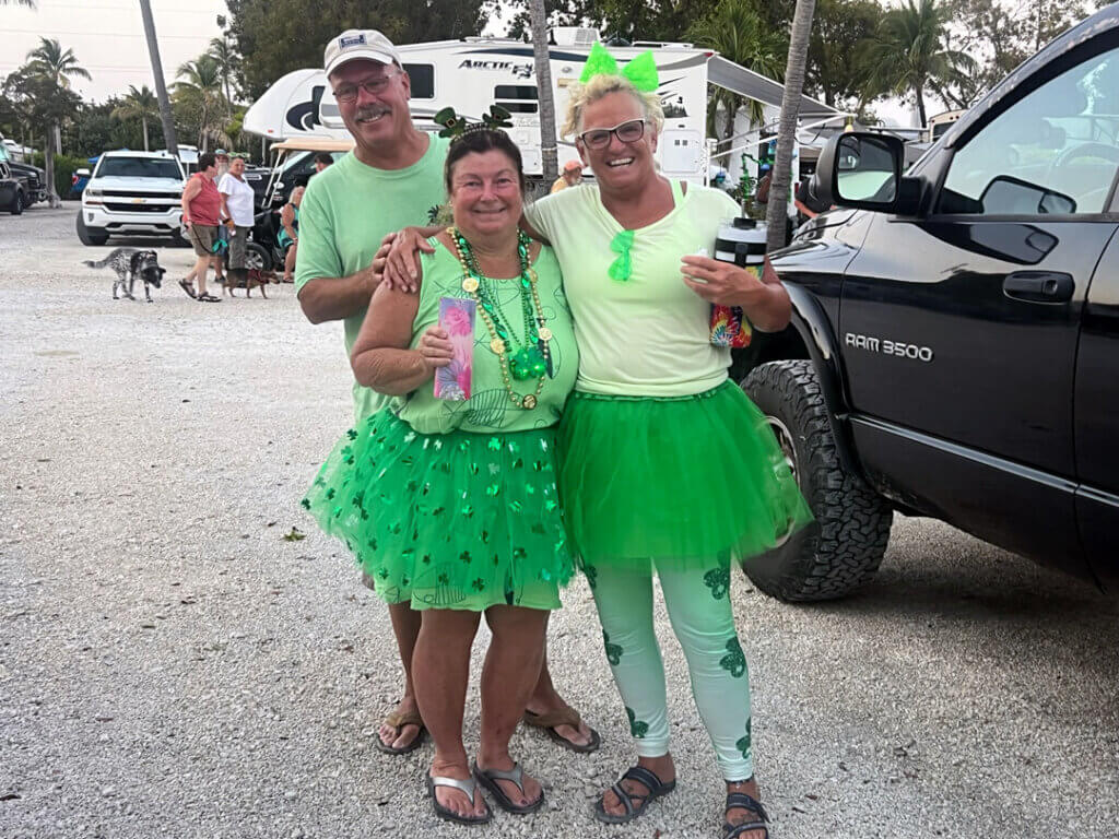Rick Middlebrook and Jill Gawne celebrate St. Pattys Day at Big pine Key RV Park with another guest  