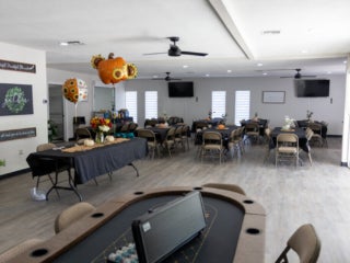 Interior view of the main room fully renovated within the West Clubhouse at Rolling Greens Village in Ocala, Florida.
