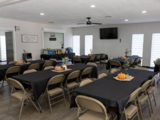 Interior view of the fully renovated main room within the West Clubhouse at Rolling Greens Village in Ocala, Florida.