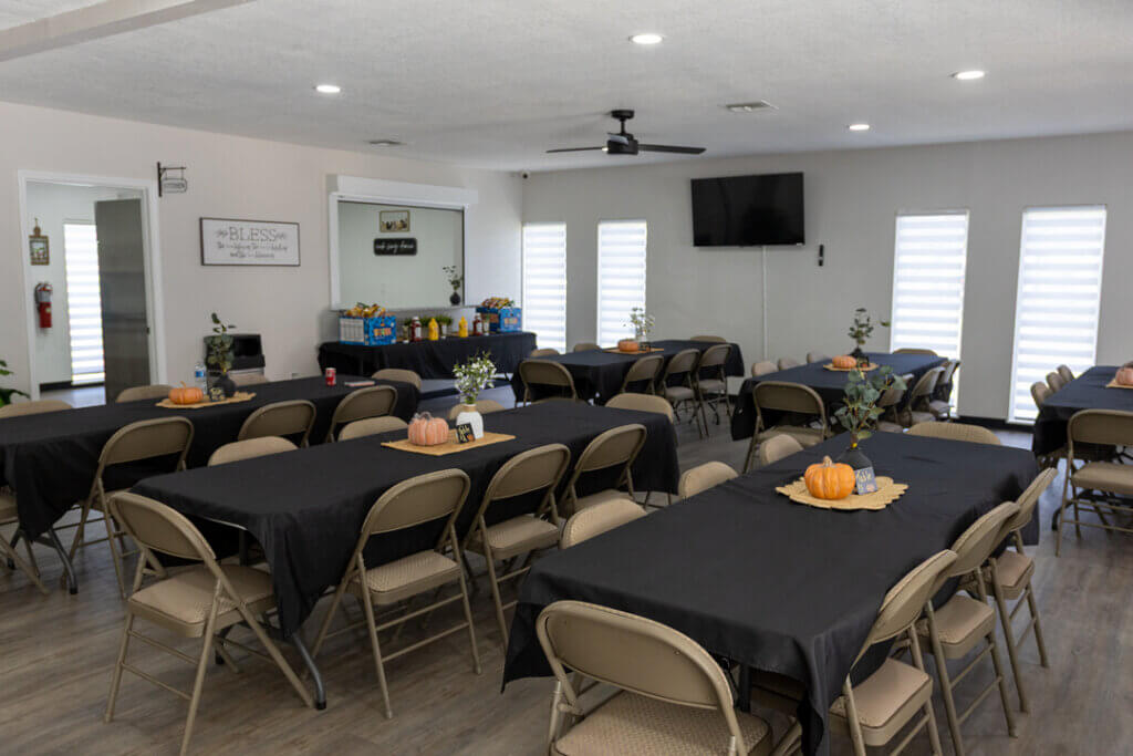 Interior view of the fully renovated main room within the West Clubhouse at Rolling Greens Village in Ocala, Florida.
