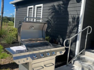 Grill raffle prize in from of West Clubhouse at the October 2025 reopening