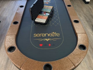 Poker table and poker chips in the fully renovated main room within the West Clubhouse at Rolling Greens Village in Ocala, Florida.