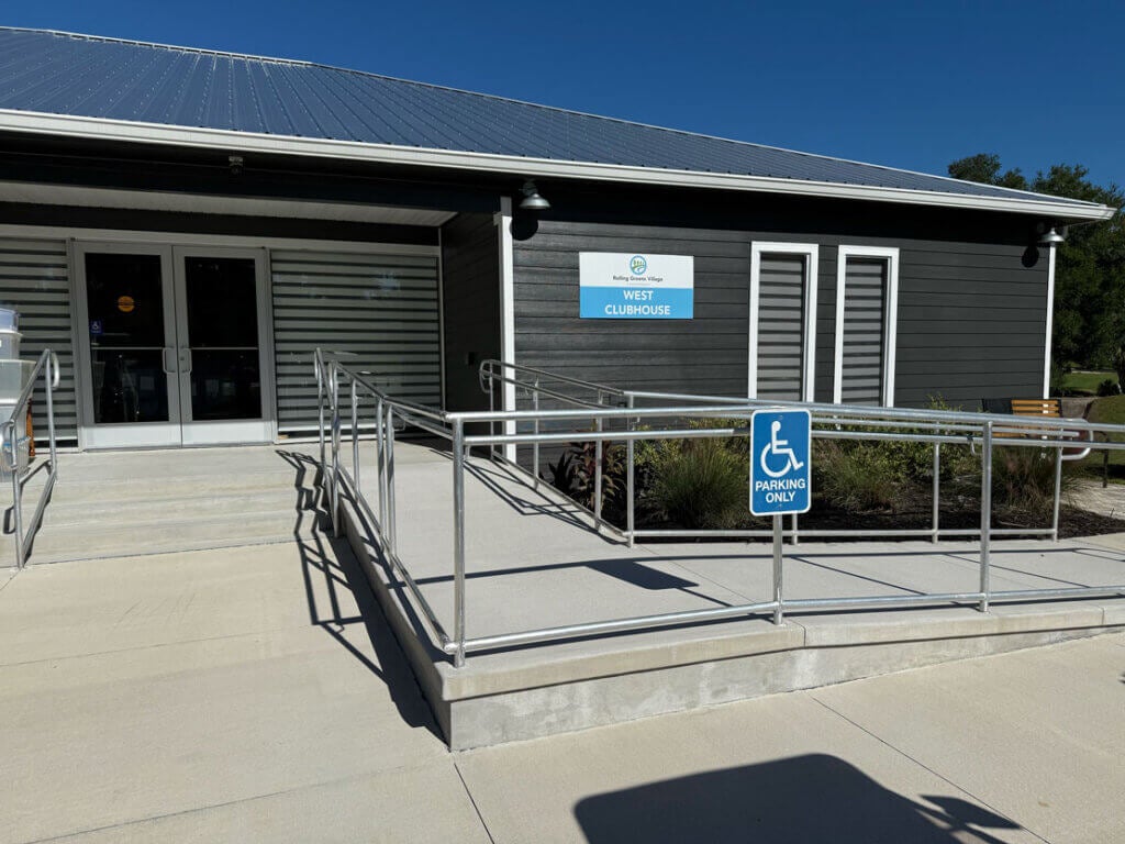 Exterior view of the renovated West Clubhouse and the USDA compliant ramp