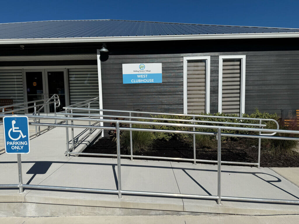 Exterior view of the renovated West Clubhouse and the USDA compliant ramp