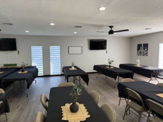 Interior view of the fully renovated main room within the West Clubhouse at Rolling Greens Village in Ocala, Florida.